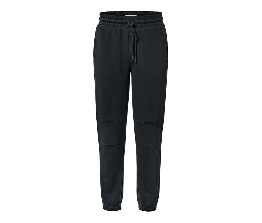 Pantalon molletonné noir avec cordon de serrage à la taille.