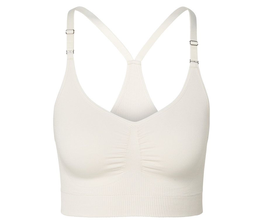 Soutien-gorge de sport beige à fines bretelles.