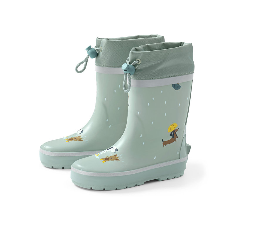 Bottes de pluie vertes avec motif de chien.