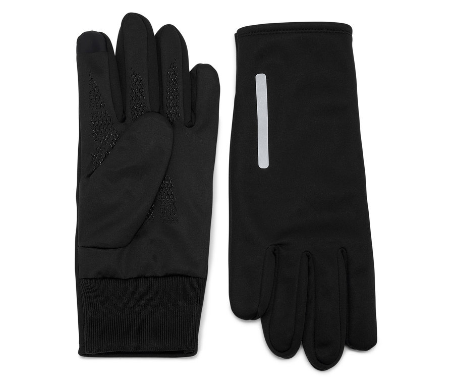 Deux gants noirs sont posés côte à côte.