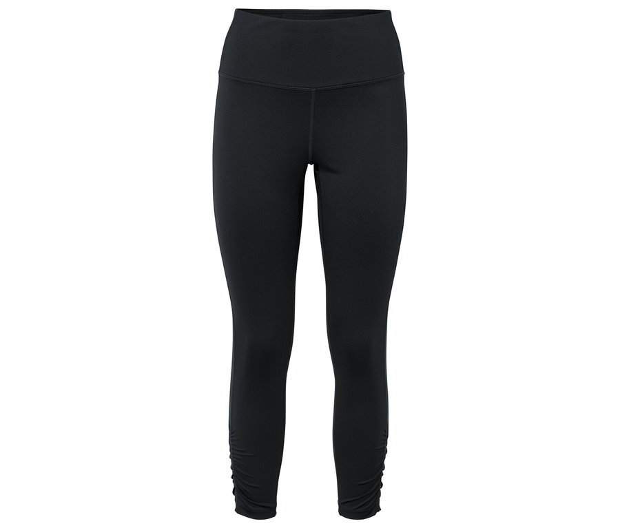 Leggings noirs avec détail froncé à l'ourlet.