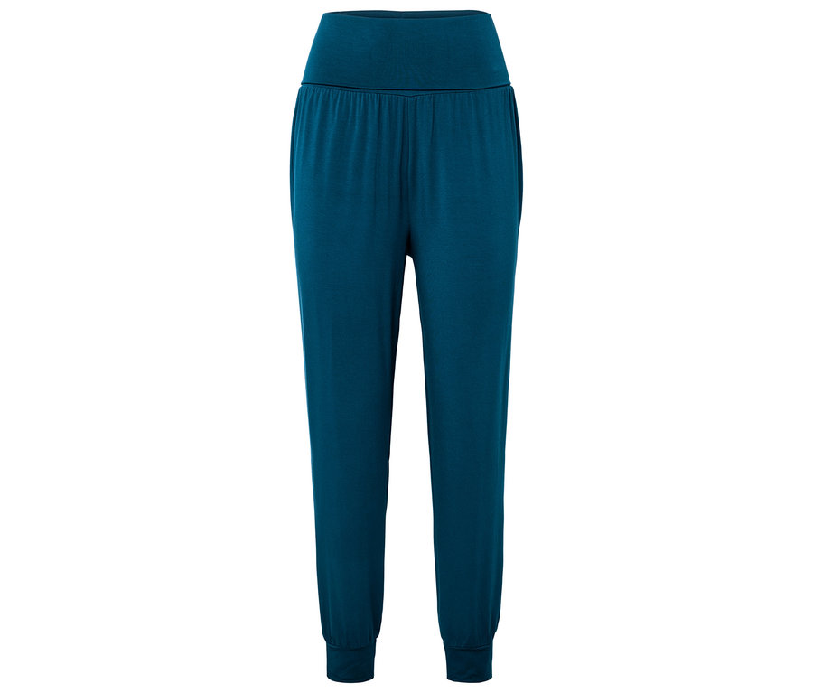 Un pantalon de jogging bleu avec une taille élastique et des poignets.