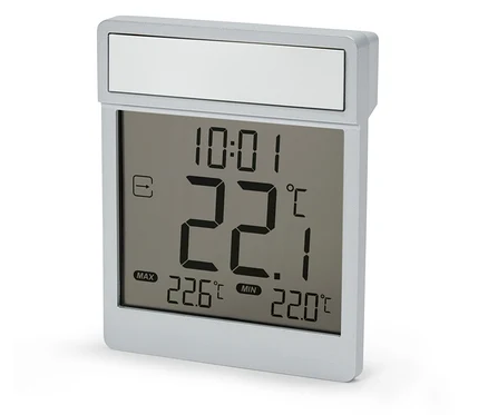 Thermomètre numérique argenté indiquant 22,1 degrés Celsius à 10h01.