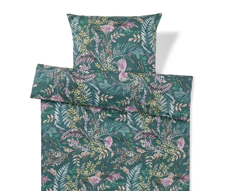 Parure de lit vert foncé avec un motif floral de feuilles et de fleurs vertes, jaunes, roses et violettes.