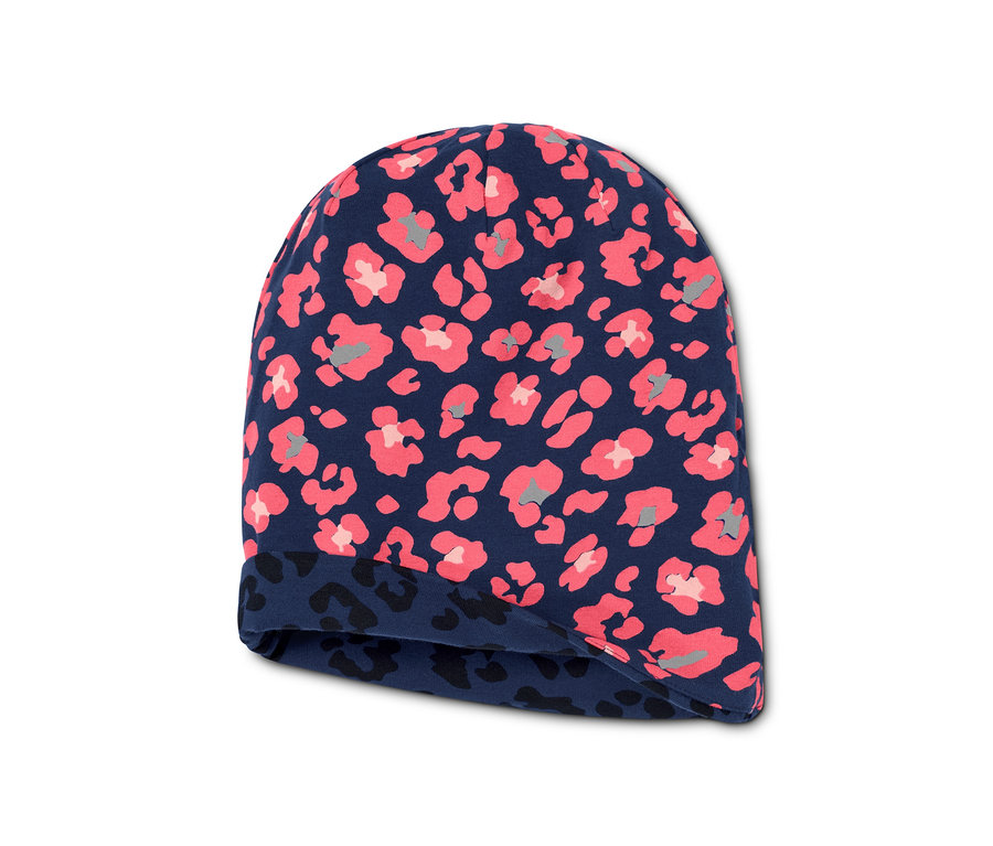 Bonnet réversible bleu marine avec motif animal rose et gris.