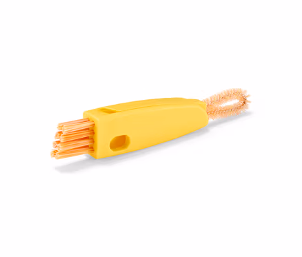 Brosse de nettoyage 3 en 1 jaune avec des poils orange.