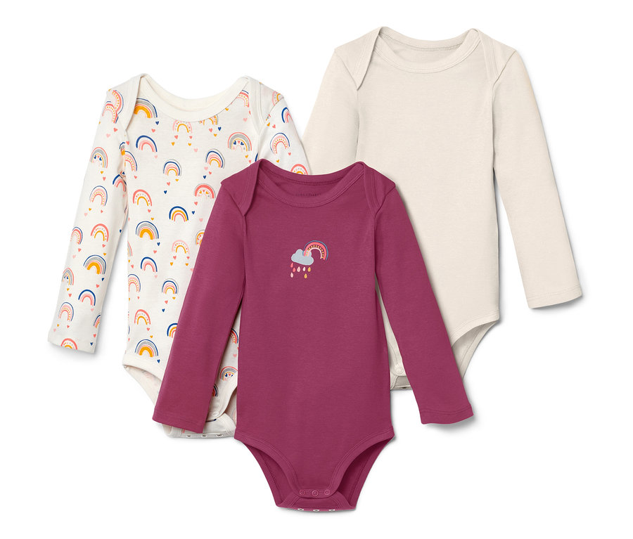 Trois bodies à manches longues avec motifs arc-en-ciel.