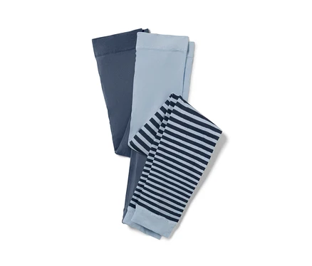 Deux leggings fins pour enfants : un bleu foncé, un bleu clair avec des rayures bleu foncé.