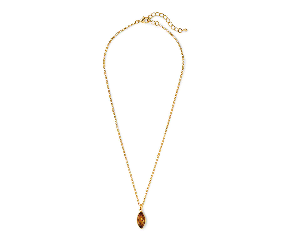 Chaîne dorée avec un cristal navette marron.