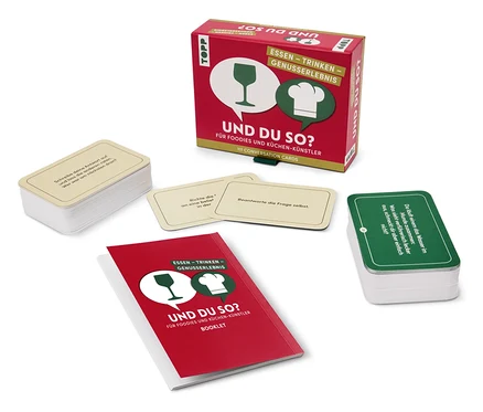 L'image montre un jeu de cartes de questions pour les gourmets et les passionnés de cuisine intitulé "UND DU SO ?". Le jeu comprend une boîte, un livret et des paquets de cartes.