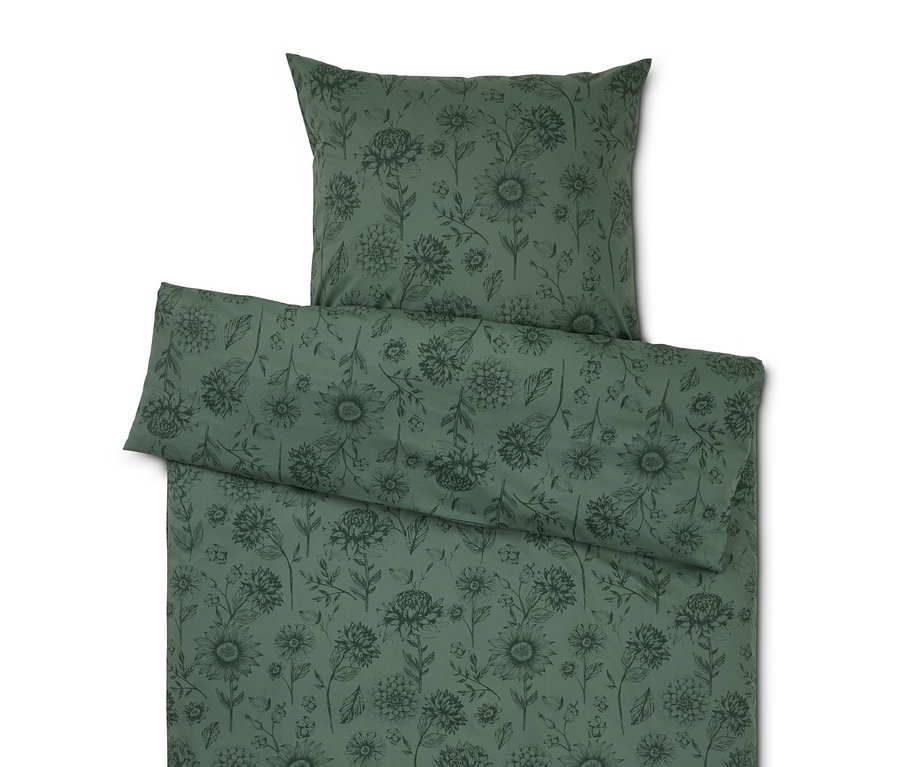 Linge de lit vert à motif floral, comprenant un oreiller et une couette.