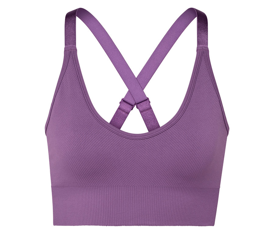 Gros plan d'un soutien-gorge de sport violet avec des bretelles croisées.