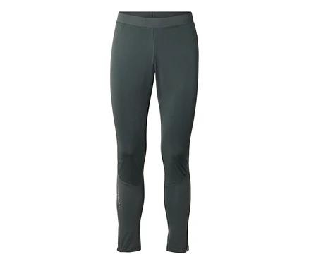 Legging de sport gris foncé avec une large ceinture, des points réfléchissants sur le mollet gauche et des fermetures éclair aux chevilles.