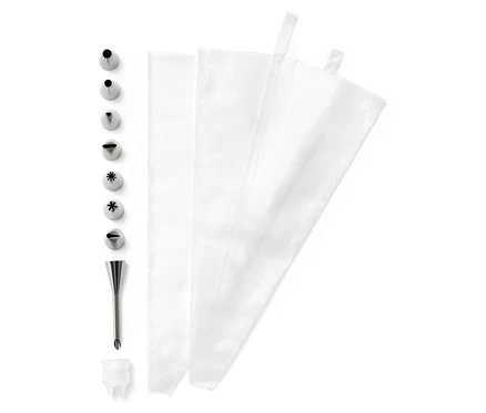 Kit de décoration de gâteaux avec plusieurs embouts en métal et poches à douille.