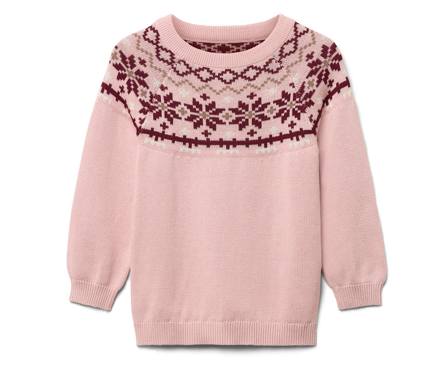 Pull rose avec motif de Noël.