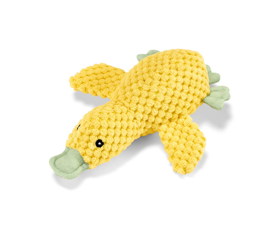 Un jouet en peluche jaune pour chien « caneton » est posé sur un fond blanc.