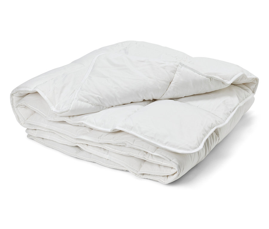 Couette blanche pliée Cell Solution® de taille normale et grande.
