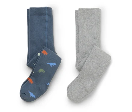 Deux collants pliés sont posés sur un fond blanc. L'un est gris, l'autre bleu avec des dinosaures.