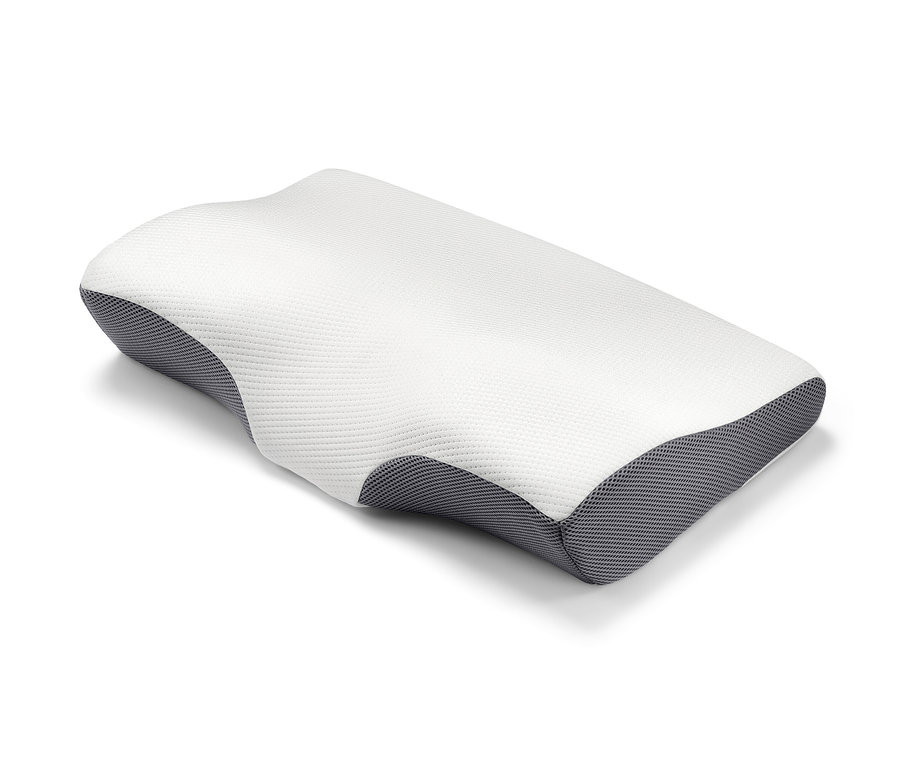 Oreiller cervical sur fond blanc.