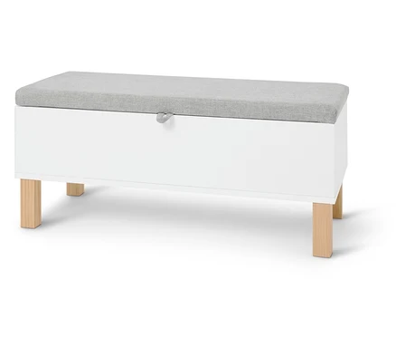 Banc coffre blanc avec coussin gris clair sur fond clair.