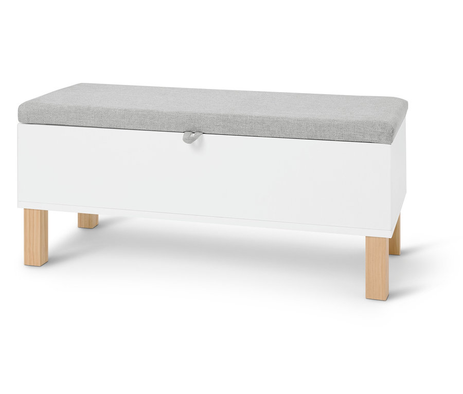 Banc coffre blanc avec coussin gris clair sur fond clair.