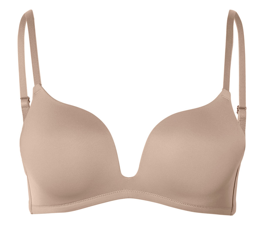 Soutien-gorge push-up beige avec décolleté en V profond et bretelles réglables.