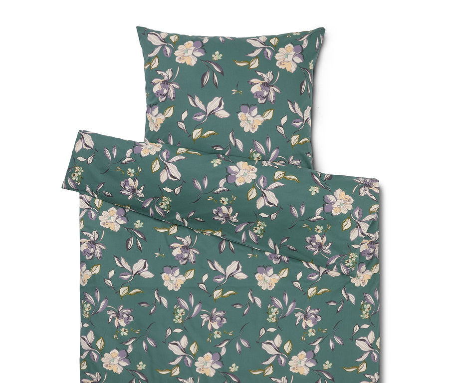 Ensemble de literie à motif floral vert comprenant une taie d'oreiller et une housse de couette.