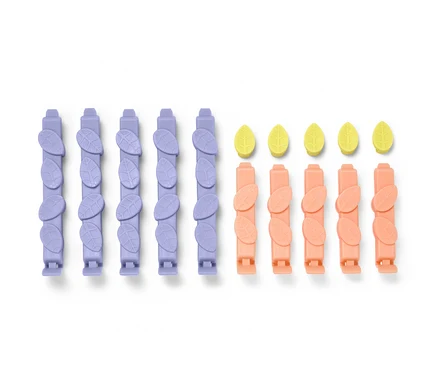 Quinze clips arôme en lilas et pêche et feuilles jaunes.