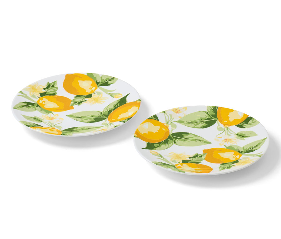 Deux assiettes à hors d’œuvre avec un motif de citrons et de fleurs.