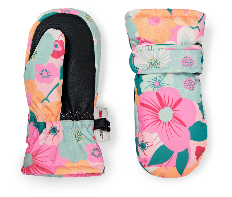 Deux moufles à motif floral sont posées l'une à côté de l'autre.