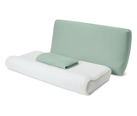 L'image montre trois oreillers : un oreiller blanc profilé, un petit oreiller rectangulaire vert clair et un grand oreiller rectangulaire vert clair.
