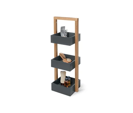 Étagère avec 3 compartiments de rangement (anthracite) remplie de cosmétiques, brosse à cheveux et bouteilles.