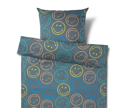 Parure de lit gris foncé avec un motif de smileys colorés en jaune, bleu, orange et turquoise, certains souriants, clignants ou avec des flèches.