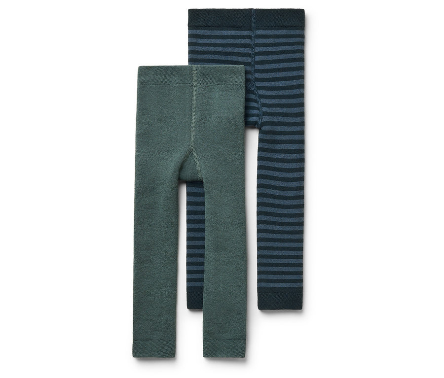 Deux leggings pour enfants : un vert et un rayé bleu et noir.