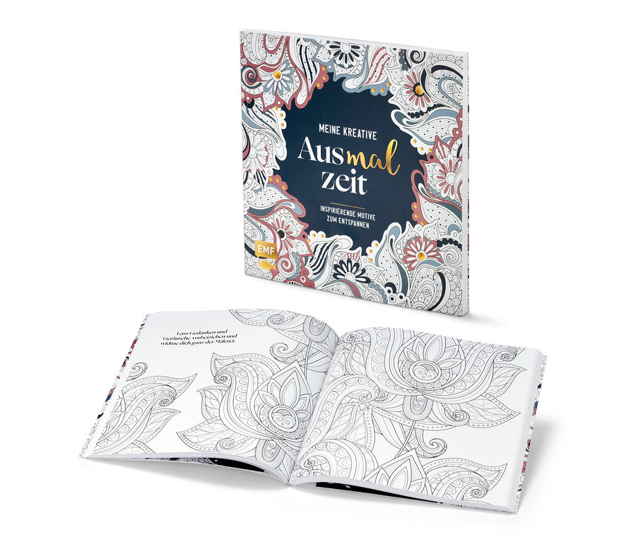 Livre ouvert « Meine kreative Ausmalzeit » (Mon moment de coloriage créatif, en allemand) avec des motifs détaillés.