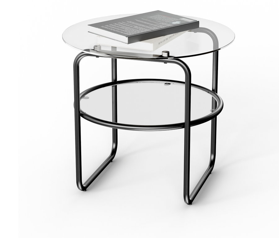 Une table ronde avec un plateau en verre et un cadre en métal noir se dresse devant un fond blanc. Un livre repose sur le plateau de la table.