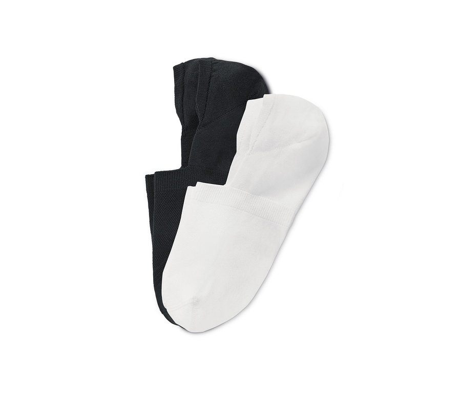 Deux paires de socquettes de sport en noir et blanc.