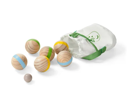 Jeu de boules avec des rayures colorées et un sac.