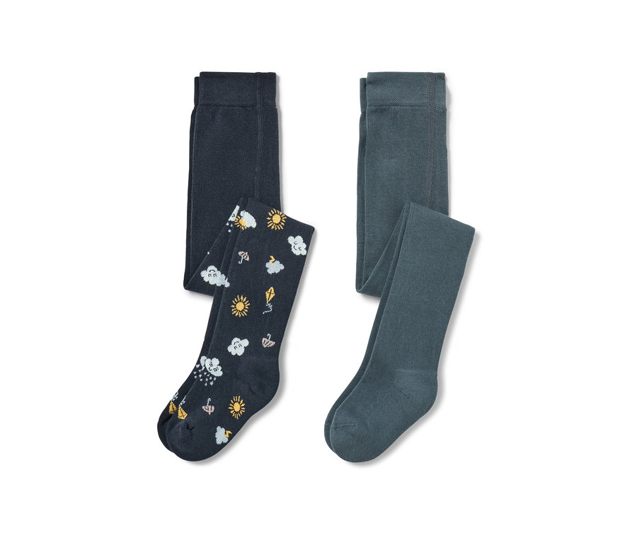 Deux collants bleus pour tout-petits, un avec des motifs de soleil, de nuages et de parapluies.