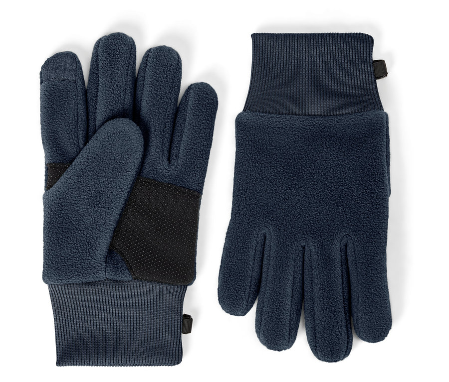 Deux gants polaires bleu marine avec une paume noire antidérapante reposent sur un fond blanc.