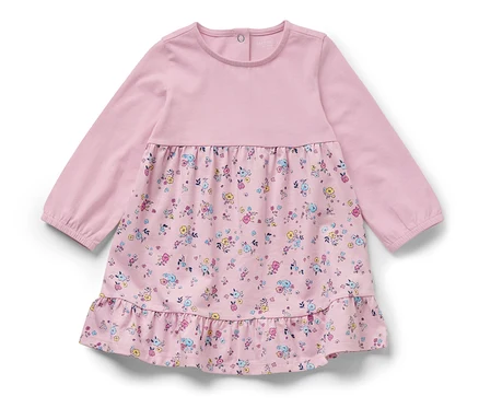 Robe en jersey rose pour bébé avec motif floral.