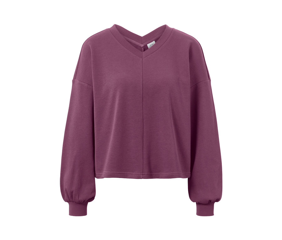 Sweat-shirt de yoga violet à manches longues.