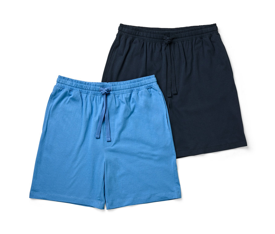Deux shorts de pyjama, un bleu clair et un bleu foncé.