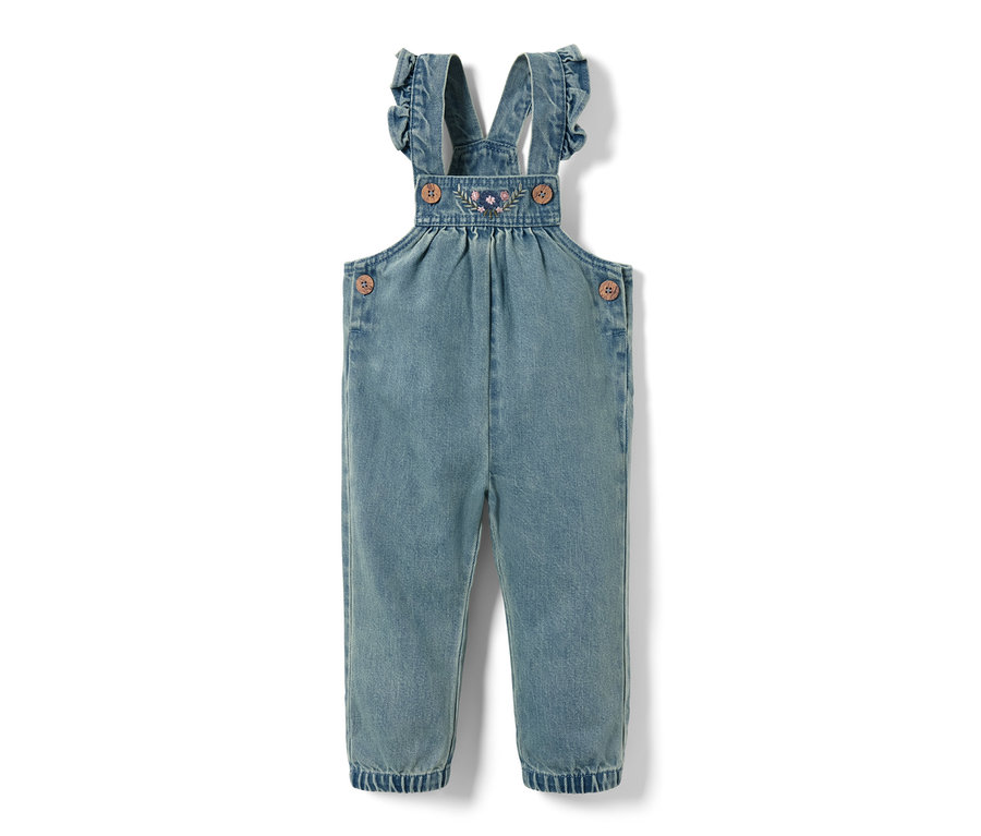 Salopette en denim avec broderie florale sur la bavette et volants sur les bretelles.