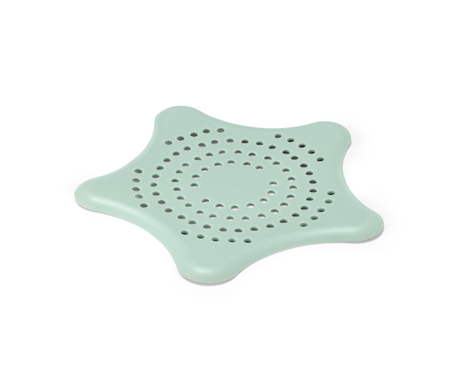 Une crépine de vidange vert menthe en forme d'étoile.