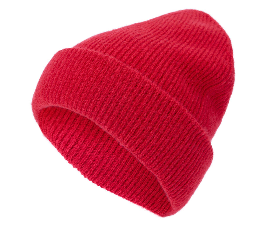 Gros plan d'un bonnet tricoté rouge.