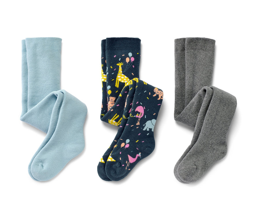 L'image montre trois collants thermiques pour enfant : une paire bleu clair, une paire bleu marine avec des motifs d'animaux et une paire grise.