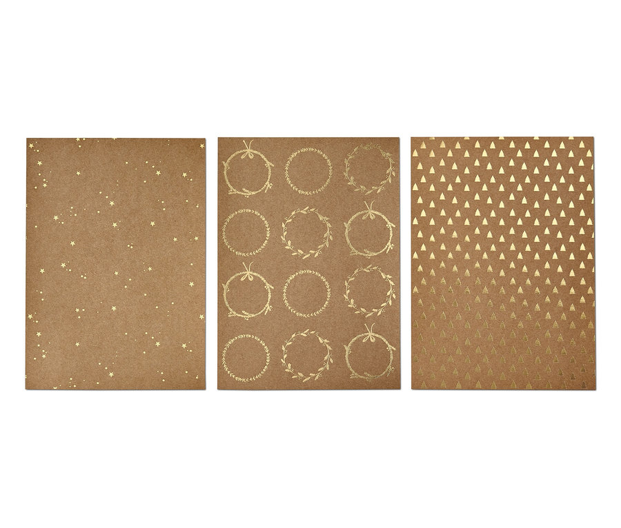 Kit de papier kraft avec motifs d'étoiles, de couronnes et de triangles.