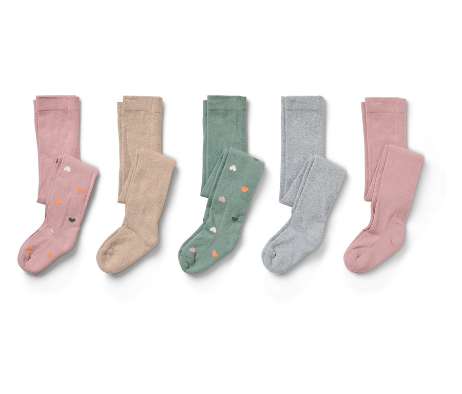 Cinq paires de collants pour enfants de différentes couleurs (rose, beige, vert, gris et rose) pliées les unes à côté des autres.