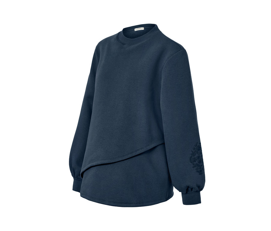 Sweat-shirt de grossesse et d'allaitement bleu marine à manches longues avec broderie florale sur la manche gauche.
